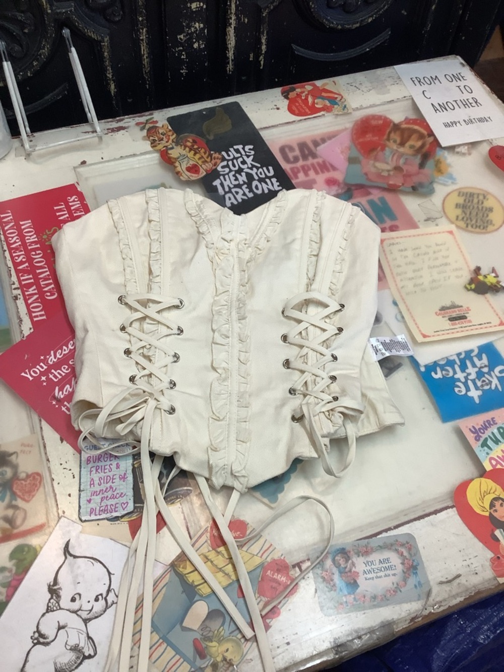 AKIRA Cream Lace-Up Ruffle Corset Camisole